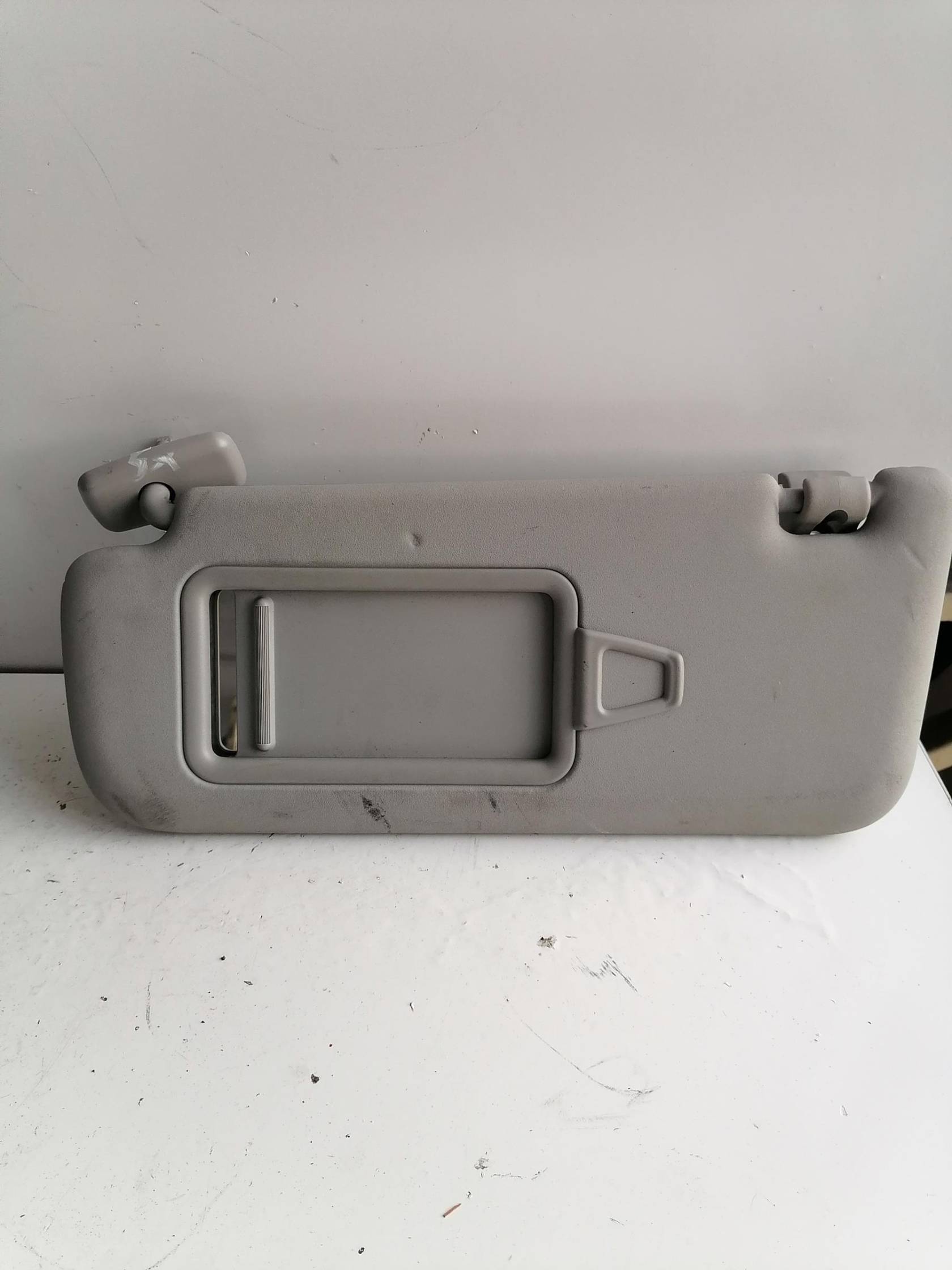 Aletta parasole parabrezza sx.